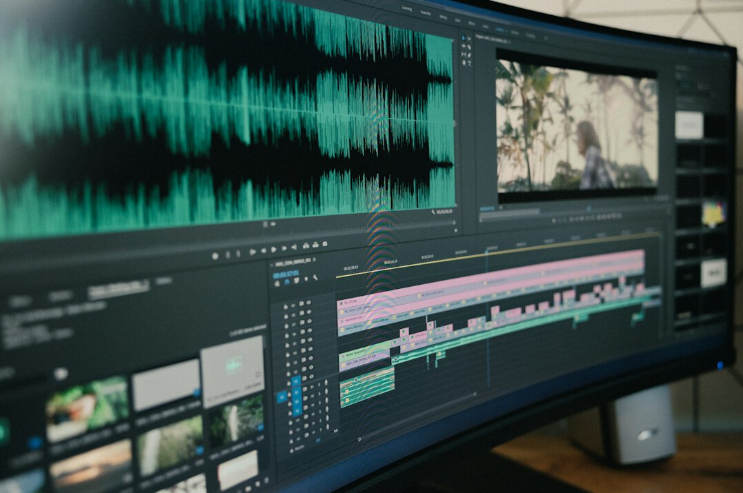 film editor working on computer